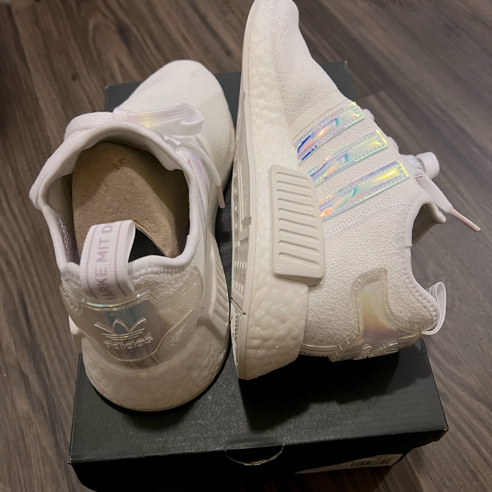 Adidas women’s shoes size 6 1/2. Brand new, just walked around house in them.